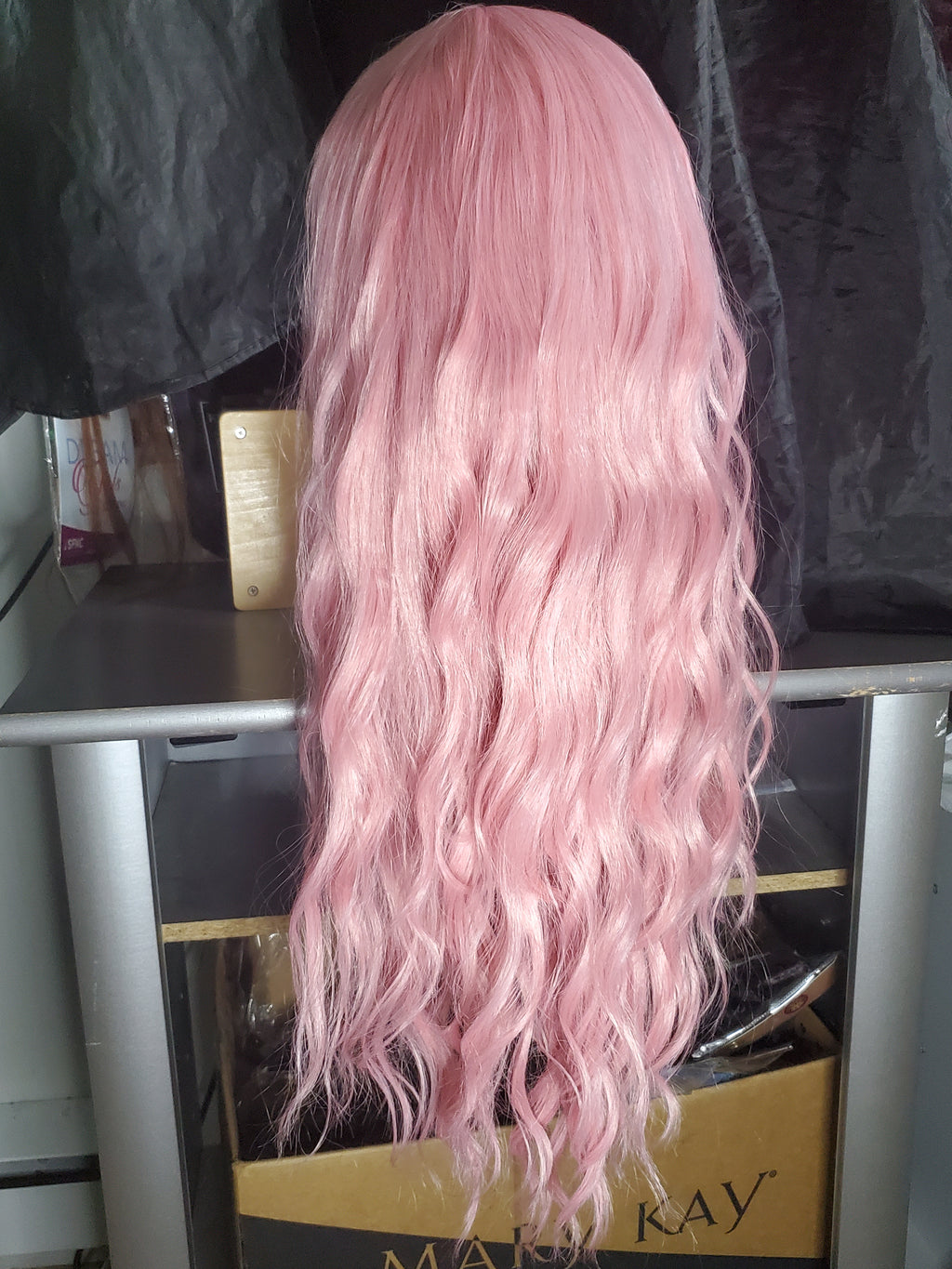 Pink wavy wig with bangs