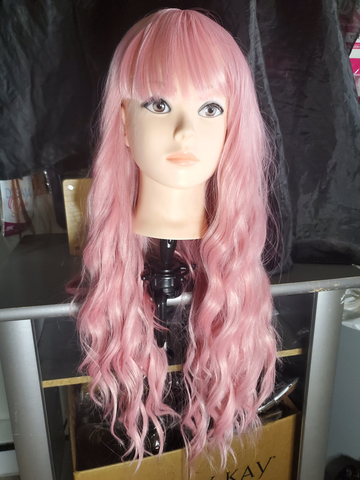 Pink wavy wig with bangs