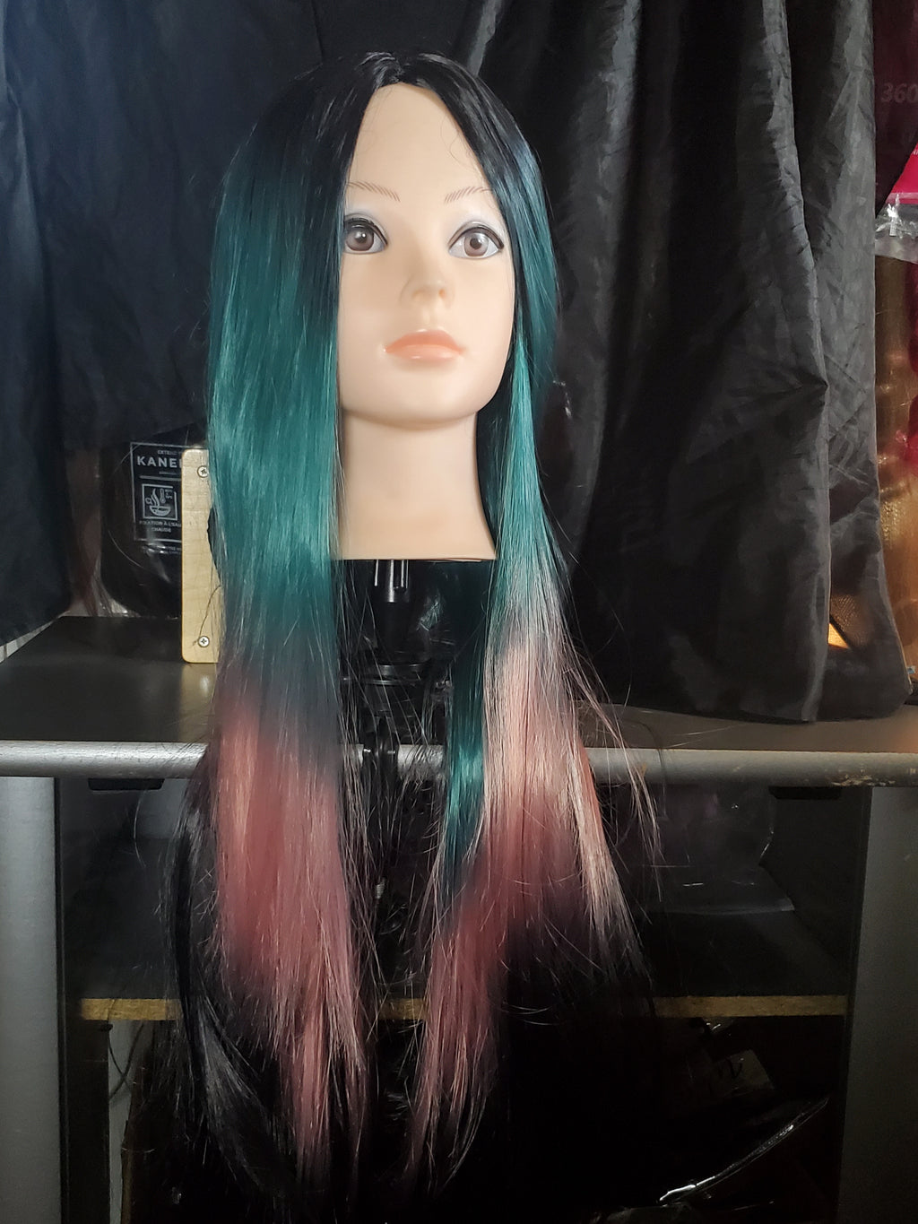 Teal-to-pink-to-black ombre wig