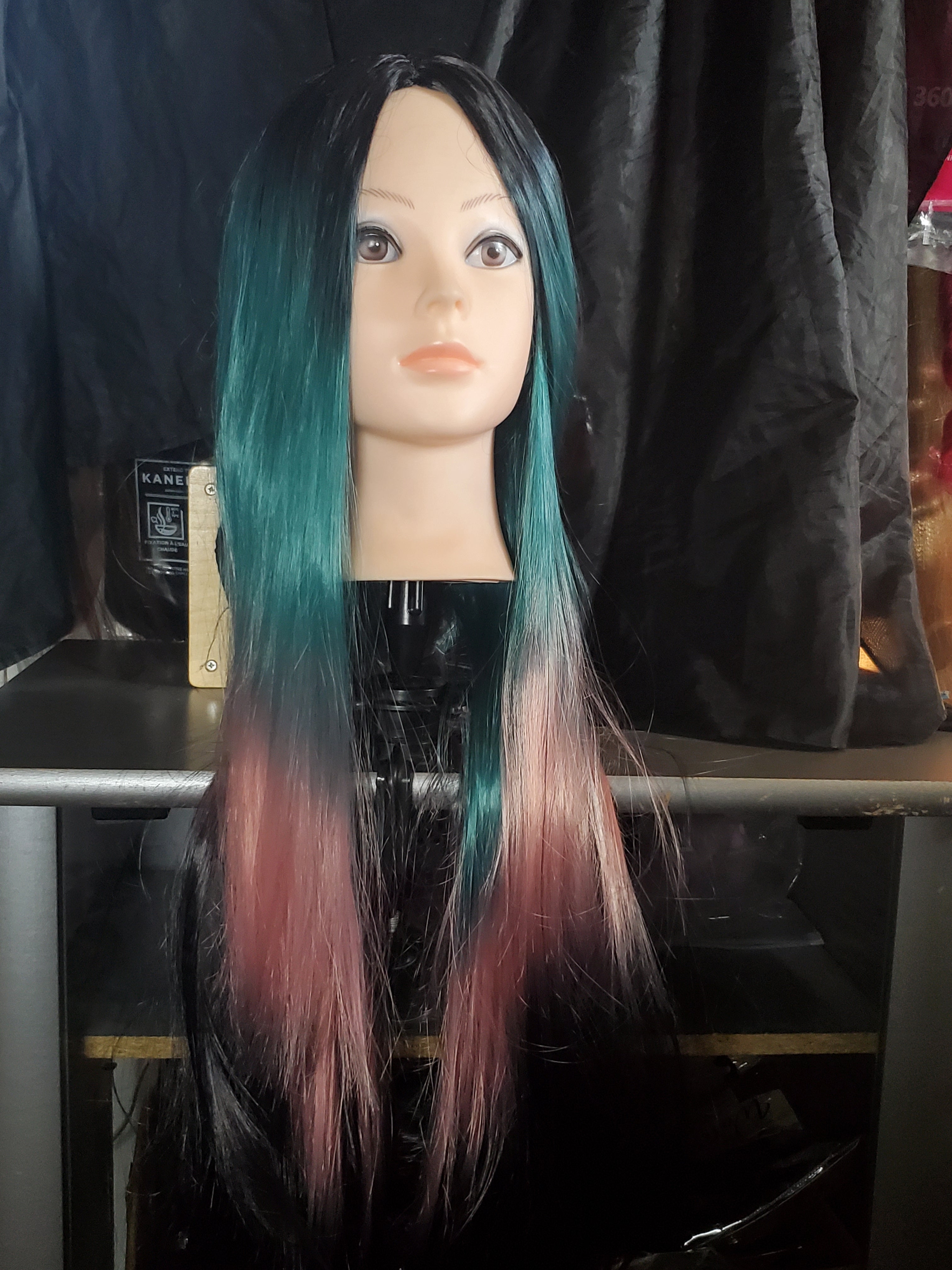 Teal-to-pink-to-black ombre wig